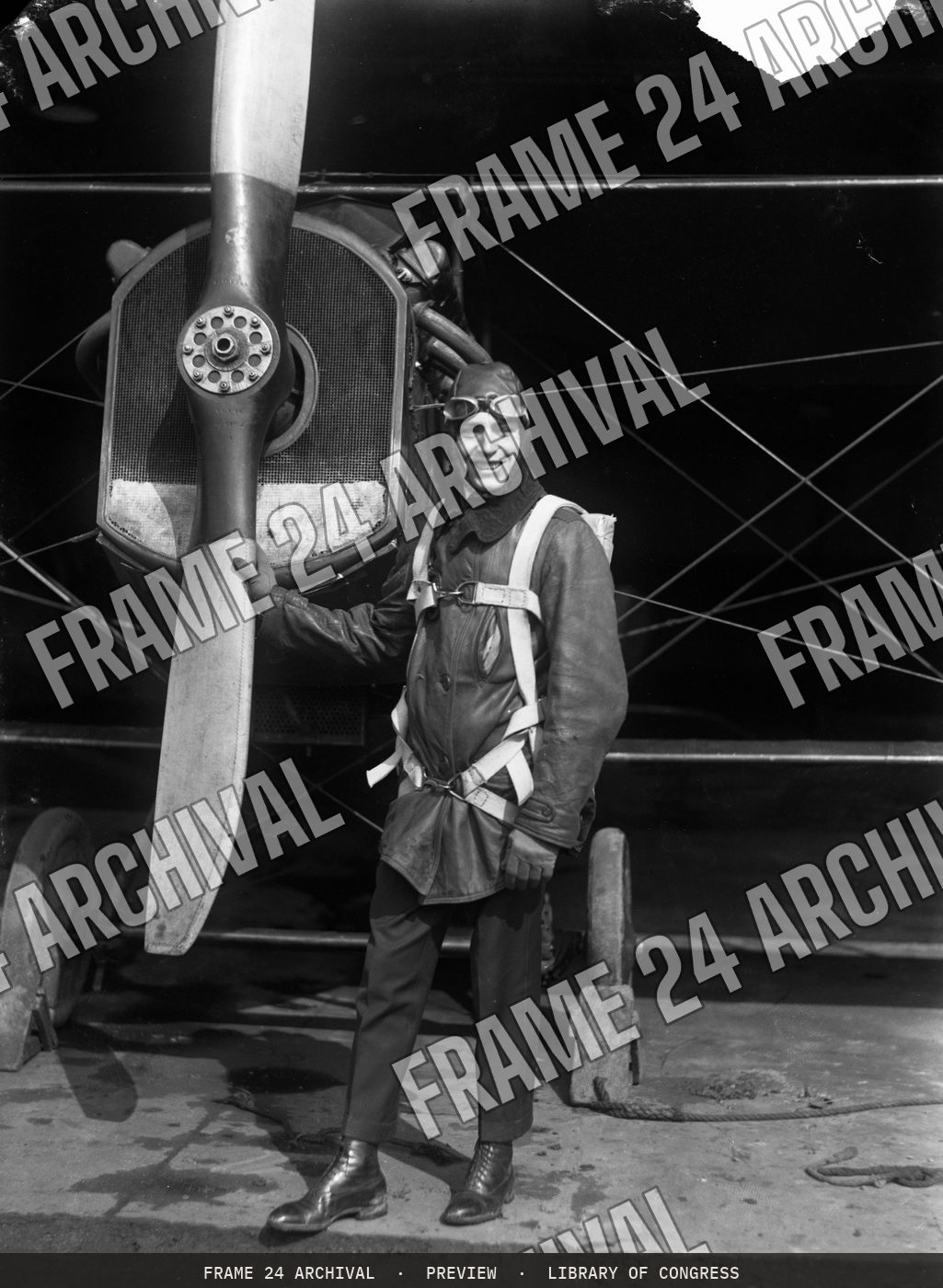 Airplane and pilot (1915), restored vintage black and white photograph