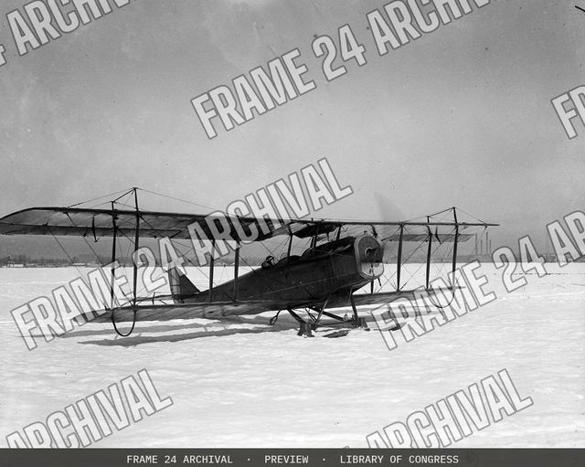 Airplane in snow, vintage black and white photograph