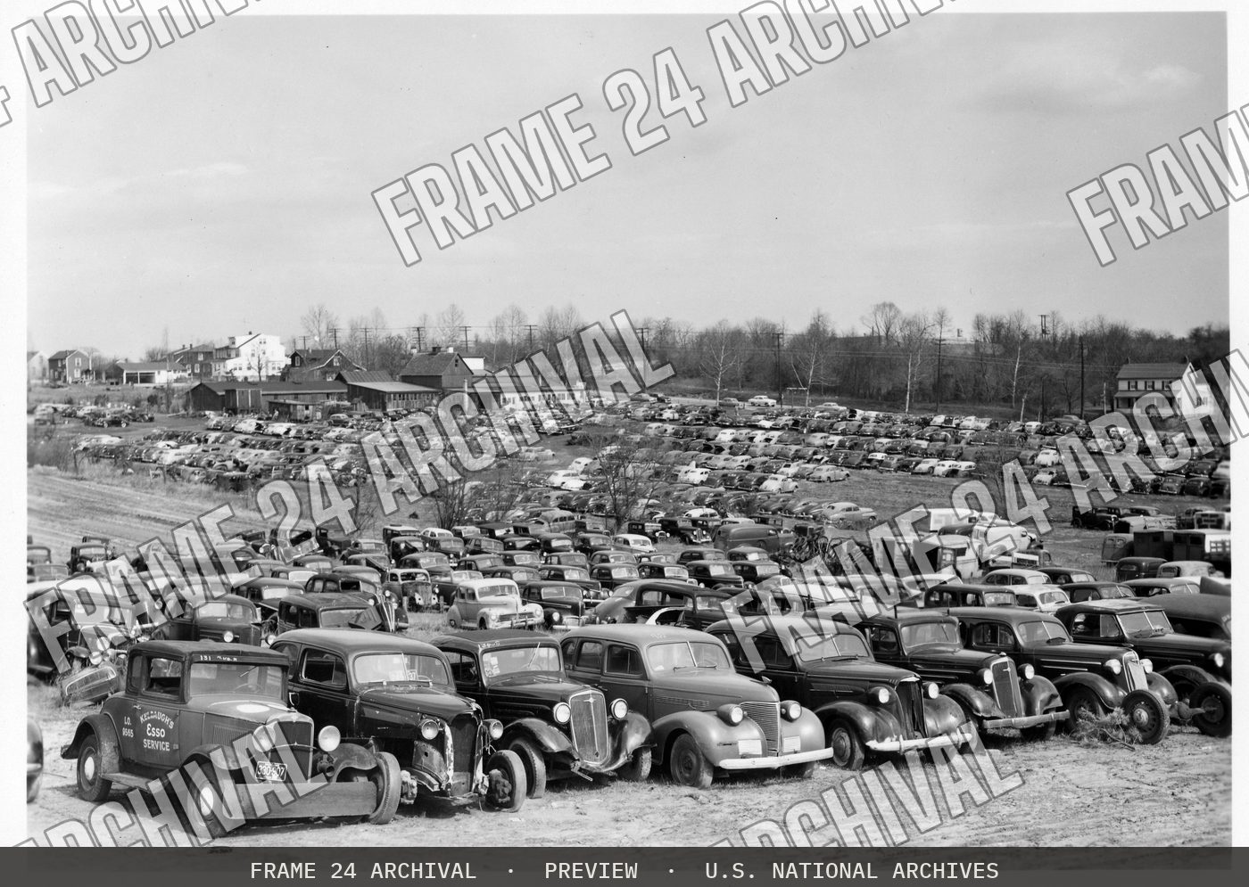 Automobile graveyard on U.S. 1 (1953), restored vintage black and white photograph