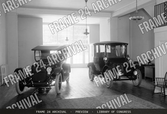 Automobile showroom, vintage black and white photograph