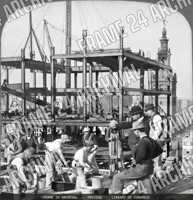 Building the great steel-framed skyscrapers -- working high above the street-- New York City, vintage black and white photograph