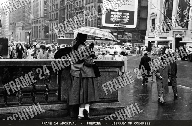 Busy city street, vintage black and white photograph
