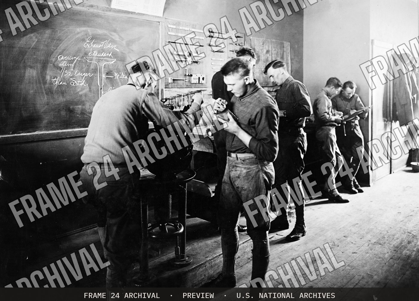 Colleges and Universities - Harley Davidson School for Motorcycle Mechanics - Studying the different parts of the motor at School for Motorcycle mechanics, restored vintage black and white photograph