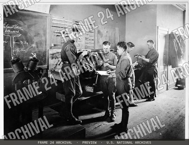 Colleges and Universities - Harley Davidson School for Motorcycle Mechanics - Tearing down motor at school for motorcycle mechanics, vintage black and white photograph