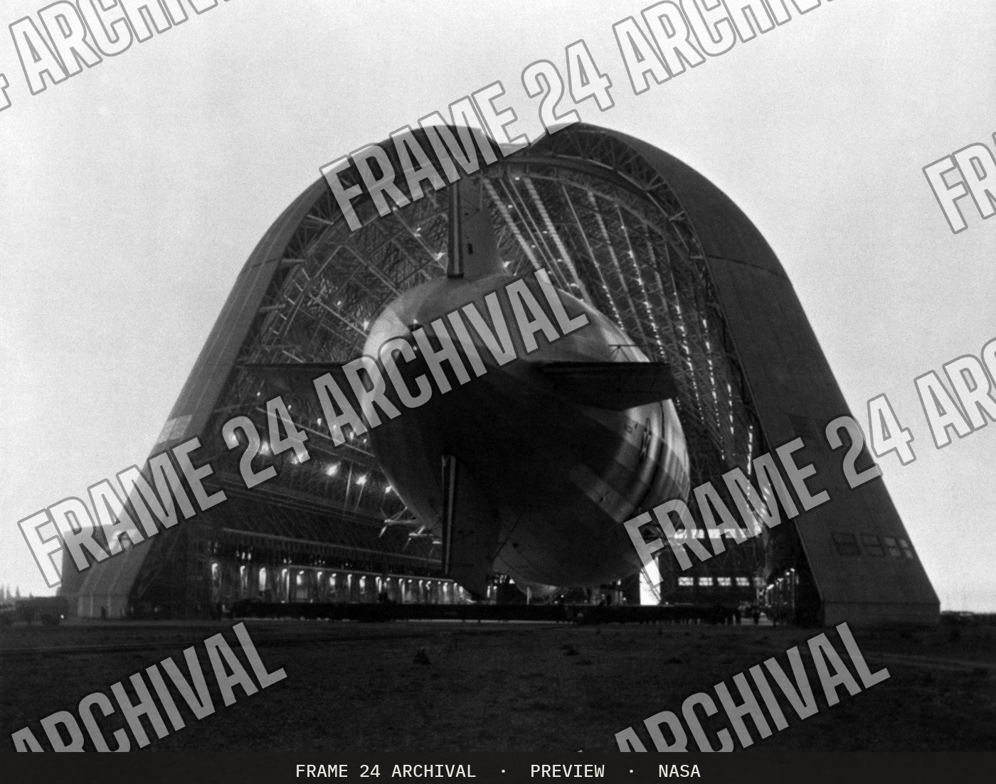 Navy Ridged Airship USS Macon being moved into Hangar 1 NAS Sunnyvale (1933), restored vintage black and white photograph
