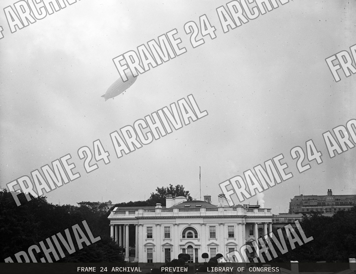 Navy ZR-1 airship flying over the White House, Washington, D.C., September 22 (1923), restored vintage black and white photograph