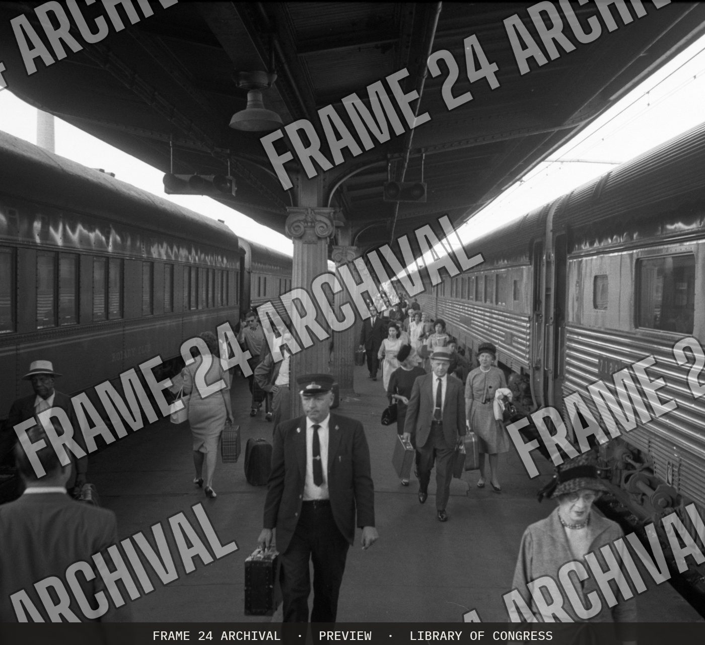 Passengers and train employees walking near trains, Union Station, Washington, D.C (1963), restored vintage black and white photograph