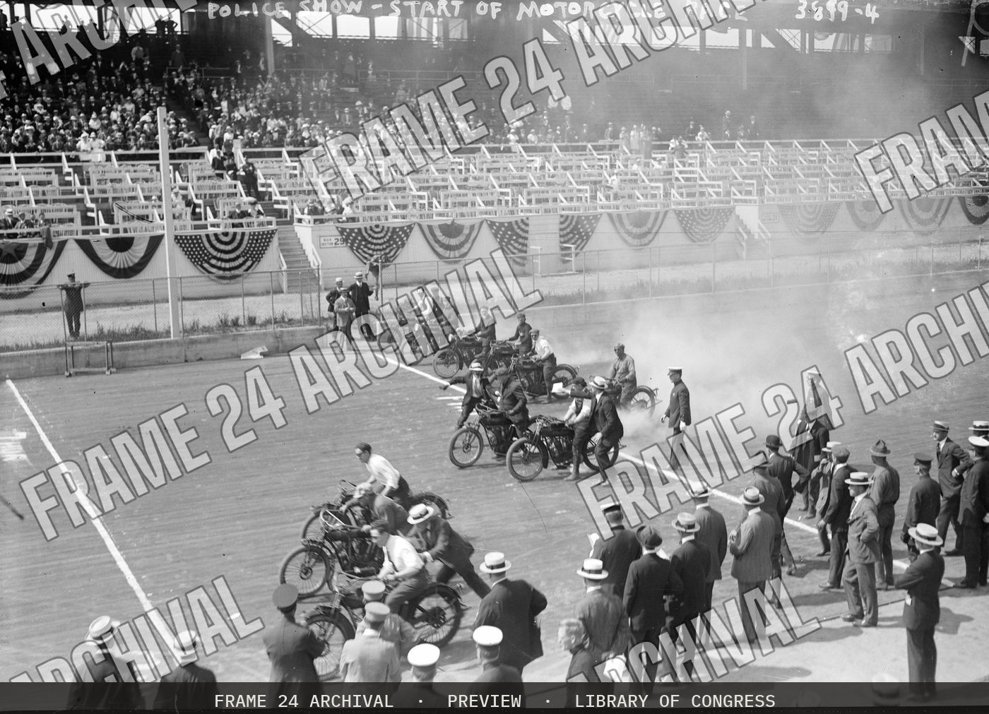 Police Show -- Start of motorcycle race (1915), restored vintage black and white photograph