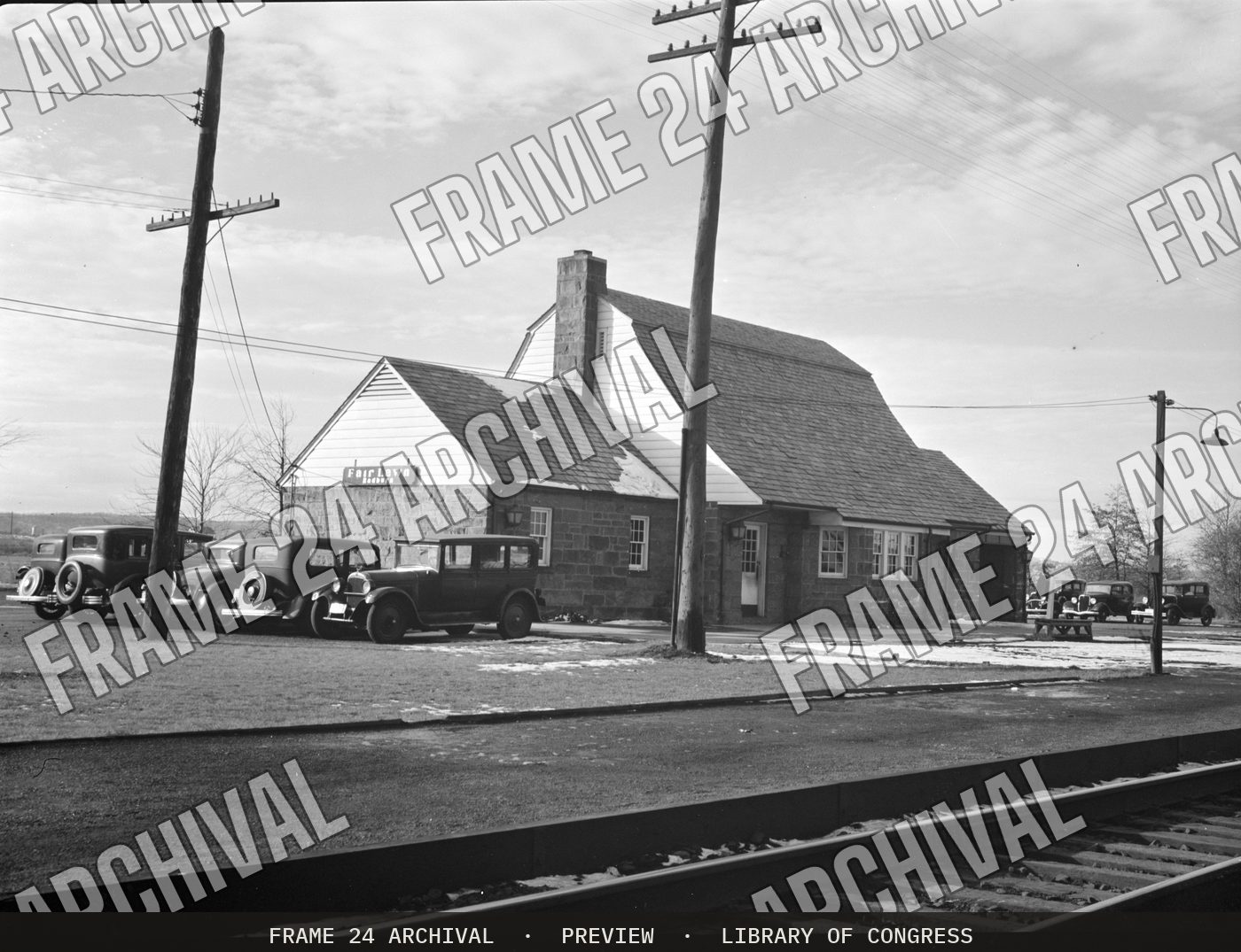 Train station. Radburn, New Jersey (1935), restored vintage black and white photograph