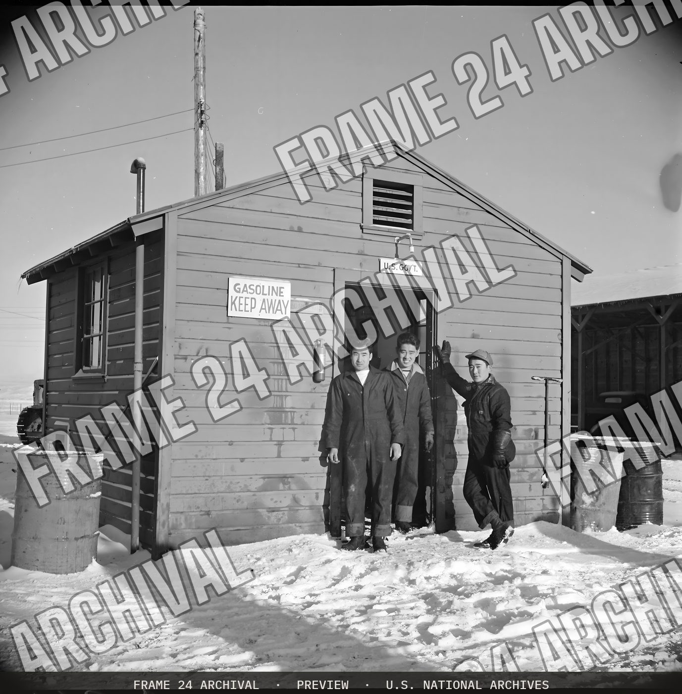 Tule Lake Relocation Center, Newell, California. Exterior views of the motor pool and gas station (1943), restored vintage black and white photograph