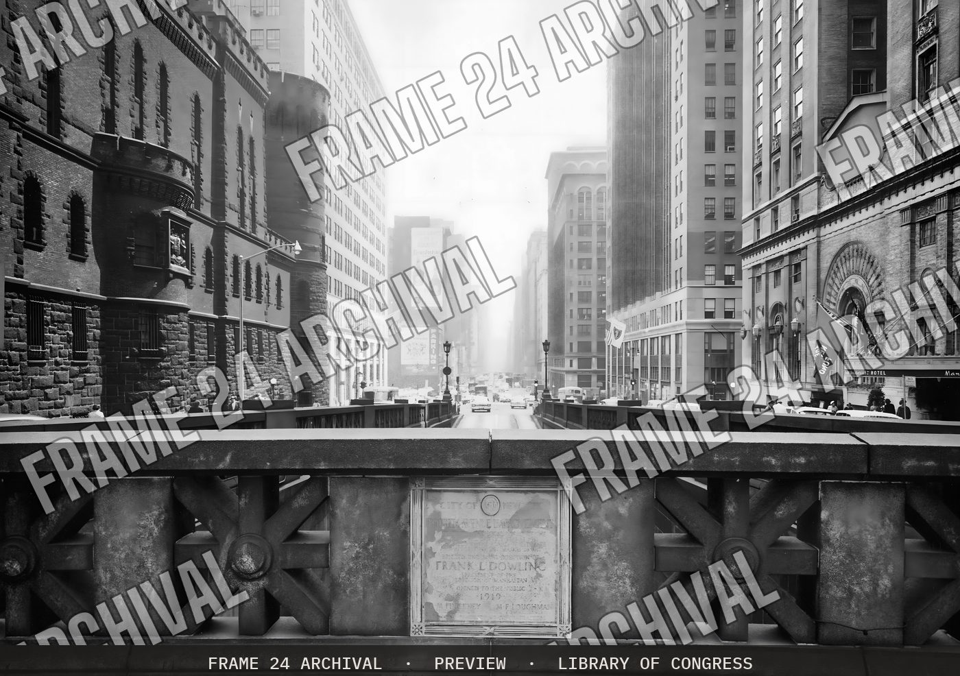 View of a city street from a bridge (1959), restored vintage black and white photograph