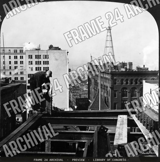 Where a step backward would mean eternity -- working on a skyscraper, New York, U.S.A, vintage black and white photograph